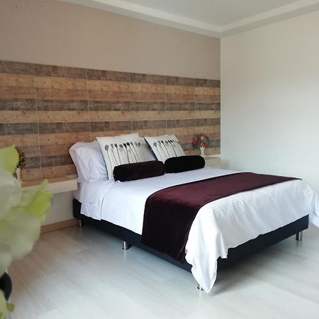 Apartasuite Laureles Cmc Medellin Bagian luar foto